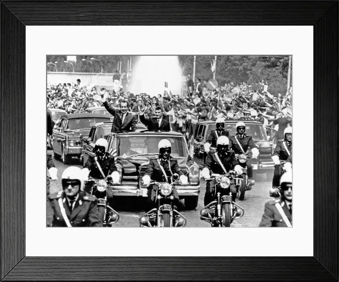 Framed Print : President Richard Nixon and President Nicolae Ceausescu wave to huge, flag-waving crowd during motorcade in Bucharest, Romania