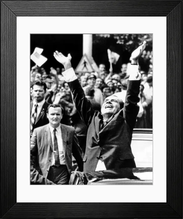 Framed Print : President Richard Nixon jubilantly acknowledges the cheers of apartment house dwellers as his motorcade proceeds through Bucharest. August 2, 1969