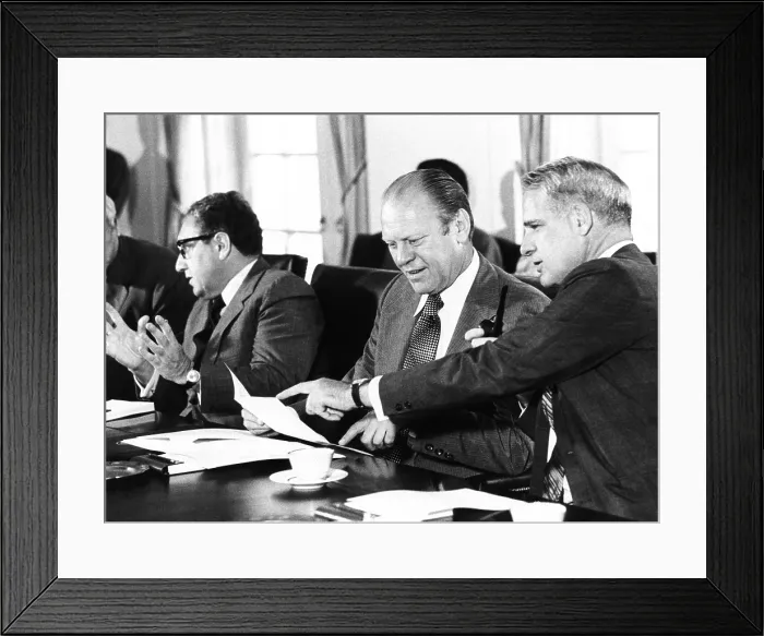 Framed Print : Gerald Ford at a Cabinet meeting during his first month as President. L-R: Henry Kissinger, Secy. of State; Pres. Ford; James Schlesinger, Defense Secy. Aug. 26, 1974 Framed Print : Gerald Ford at a Cabinet meeting during his first month as President. L-R: Henry Kissinger, Secy. of State; Pres. Ford; James Schlesinger, Defense Secy. Aug. 26, 1974
