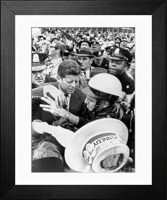 Framed Print : Democratic Presidential nominee John Kennedy campaigning. Police help him to his car through a crowd of supporters in Willow, Grove, Pennsylvania. Oct. 29, 1960