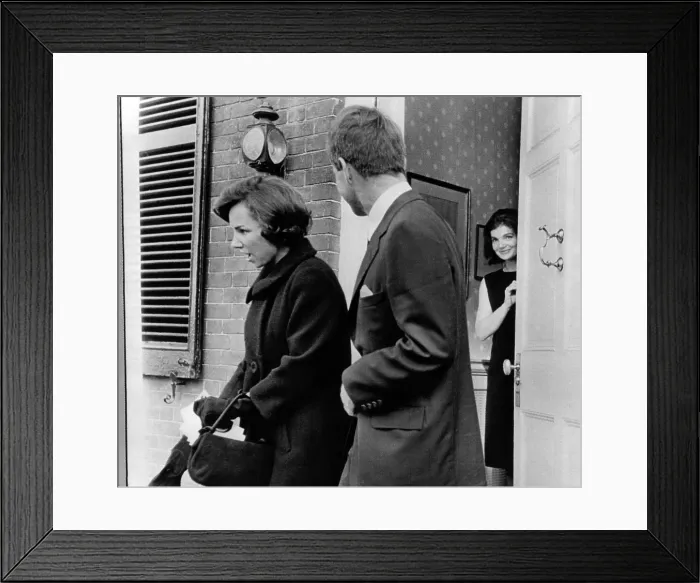Framed Print : Jacqueline Kennedy, in doorway of her temporary Georgetown home after leaving the White House. Robert and Ethel Kennedy, helped the former First Lady move out of the White House