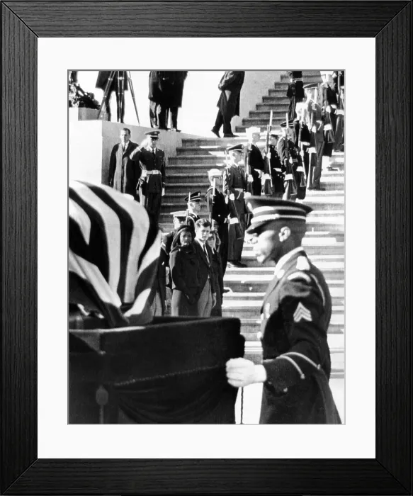 Framed Print : Jacqueline Kennedy, in a widow's veil, watches as coffin containing the body President John Kennedy, is placed on caisson Framed Print : Jacqueline Kennedy, in a widow's veil, watches as coffin containing the body President John Kennedy, is placed on caisson