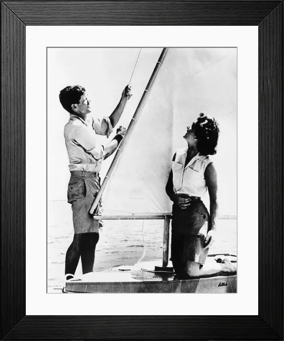 Framed Print : Senator John F. Kennedy and his fiance Miss Jacqueline Bouvier of Newport, relaxing at the Kennedy's summer home in Hyannis, Mass. June 26, 1953