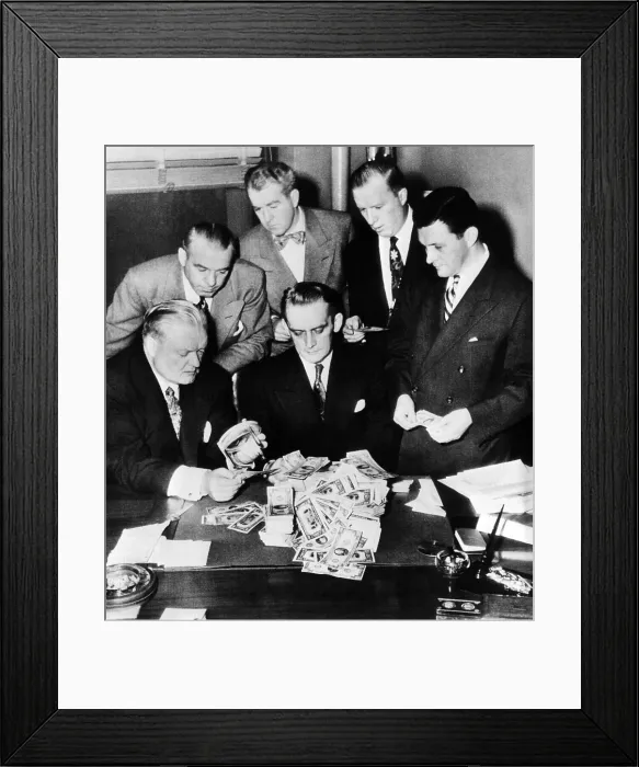 Framed Print : Federal and State men looking at part of $100, 000 of counterfeit money seized in Chicago, Feb, 2, 1952 Framed Print : Federal and State men looking at part of $100, 000 of counterfeit money seized in Chicago, Feb, 2, 1952
