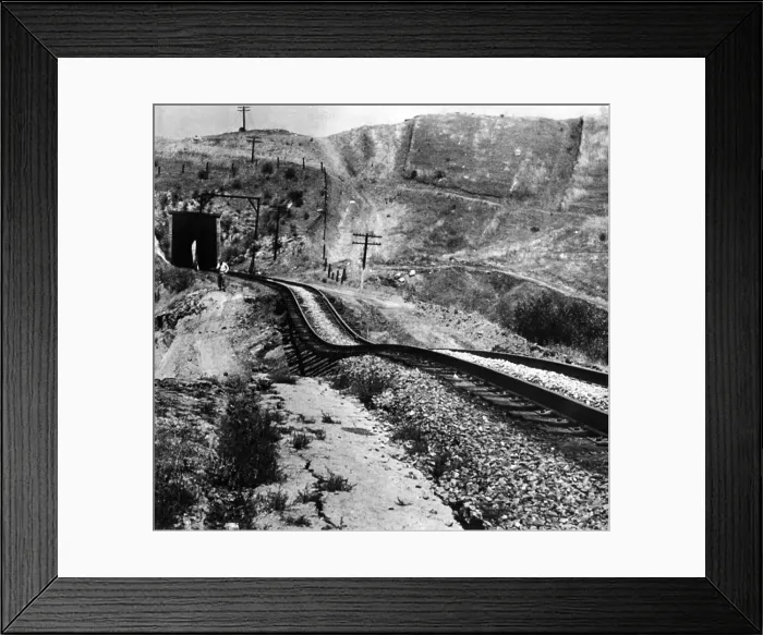 Framed Print : Railroad tracks damaged by an earthquake. Tehachapi, California was hit by a magnitude 7.3 Richter scale earthquake on White Wolf Fault in Kern County. 9 people were killed