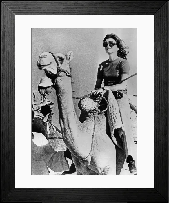 Framed Print : Jacqueline Kennedy Onassis riding a camel while on vacation in Egypt. March 28, 1974. (CSU_ALPHA_885) CSU Archives / Everett Collection Framed Print : Jacqueline Kennedy Onassis riding a camel while on vacation in Egypt. March 28, 1974. (CSU_ALPHA_885) CSU Archives / Everett Collection