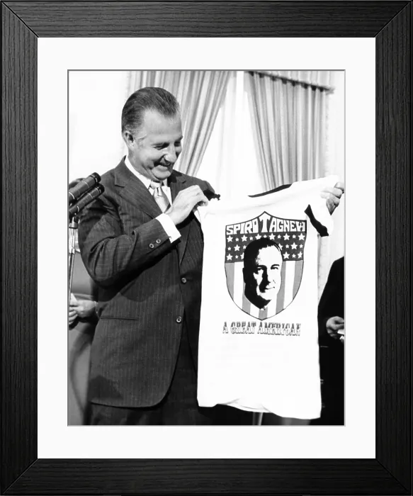 Framed Print : Vice President Spiro Agnew admires a T-shirt presented him Framed Print : Vice President Spiro Agnew admires a T-shirt presented him
