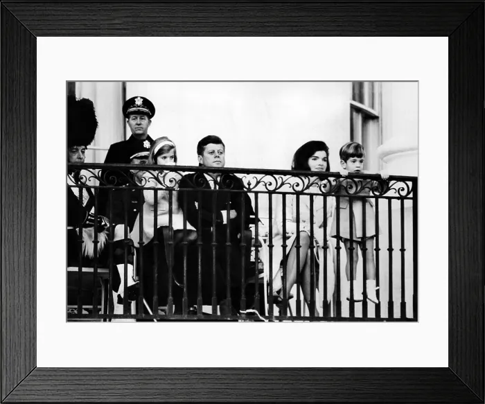 Framed Print : John F. Kennedy Jr. gets a closer look at the famed Black Watch (Royal Highland Regiment) Pipe and Drum Corps