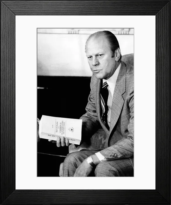 Framed Print : President Gerald Ford holds the Official Report of the Rockefeller Commission's investigation of the CIA Framed Print : President Gerald Ford holds the Official Report of the Rockefeller Commission's investigation of the CIA