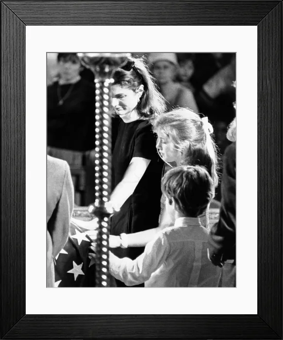 Framed Print : Jacqueline Kennedy and her children at Robert Kennedy's funeral. The former First Lady, Caroline and John Jr. touch the flag-draped coffin of Sen. Robert Kennedy in St Framed Print : Jacqueline Kennedy and her children at Robert Kennedy's funeral. The former First Lady, Caroline and John Jr. touch the flag-draped coffin of Sen. Robert Kennedy in St