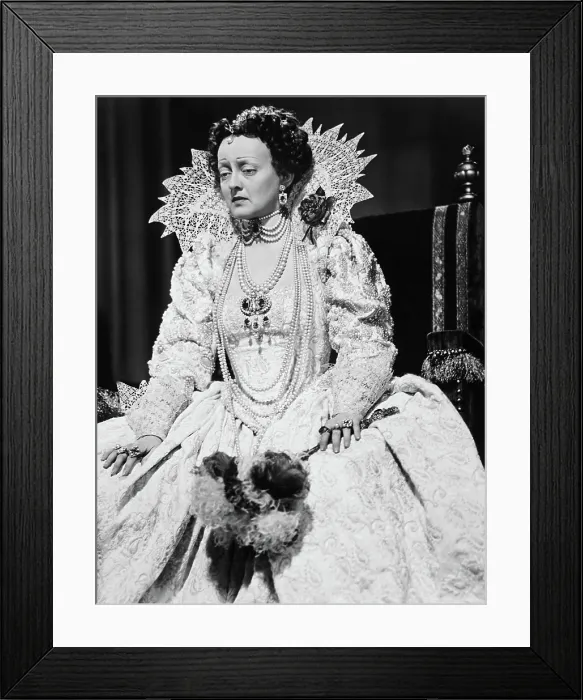 Framed Print : THE PRIVATE LIVES OF ELIZABETH AND ESSEX, Bette Davis as Queen Elizabeth, 1939 Framed Print : THE PRIVATE LIVES OF ELIZABETH AND ESSEX, Bette Davis as Queen Elizabeth, 1939