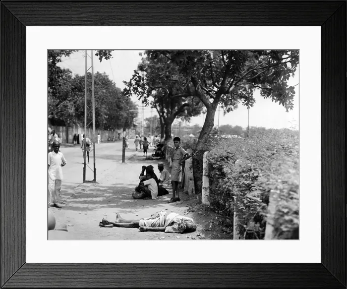 Framed Print : A dead man lies at the side of a city street in Old Delhi. Eventually the city will remove the body for cremation. July 5, 1946. (CSU_ALPHA_1461) CSU Archives / Everett Collection