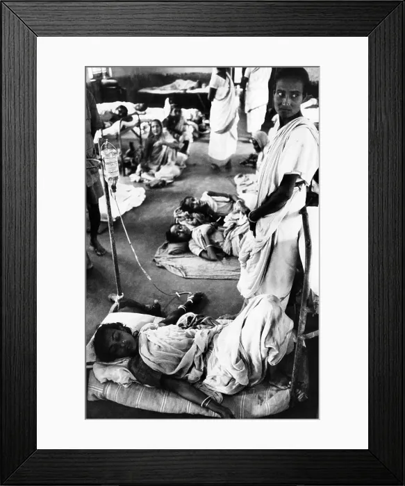 Framed Print : A women refugee from the Bangladesh Liberation War. She receives intravenous medicine in the Bongaon Subdivision Hospital near Calcutta. Nov. 1971 Framed Print : A women refugee from the Bangladesh Liberation War. She receives intravenous medicine in the Bongaon Subdivision Hospital near Calcutta. Nov. 1971