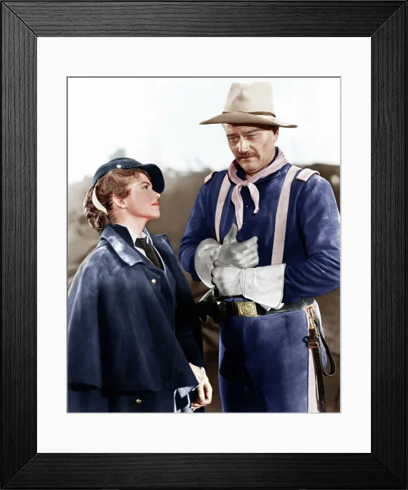 Framed Print : SHE WORE A YELLOW RIBBON, from left: Joanne Dru, John Wayne, 1949