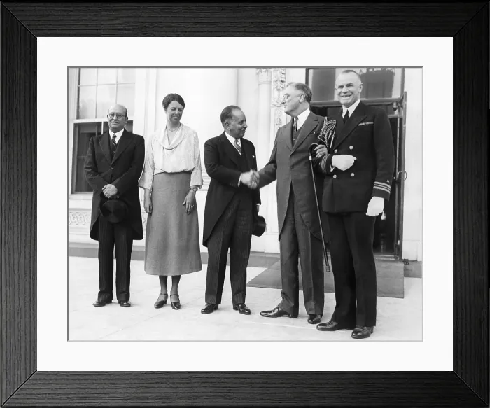 Framed Print : President Franklin and Eleanor Roosevelt welcome the Mexican Minister of Finance (center), Alberto Pani, to discuss world economic problems