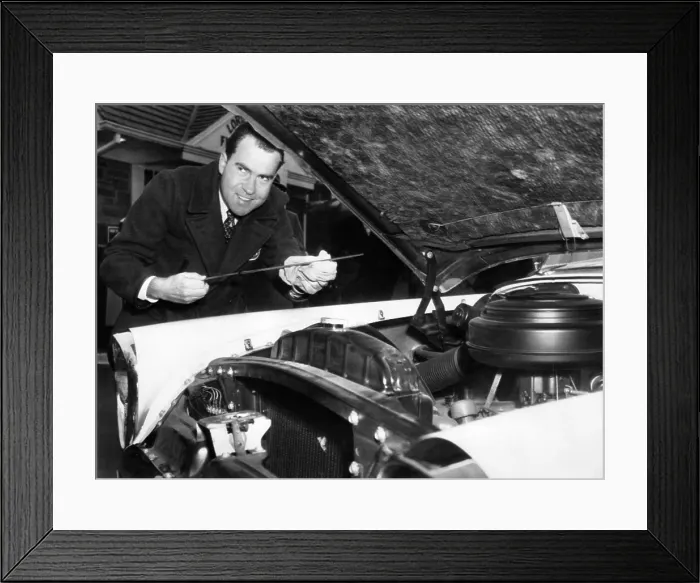 Framed Print : Vice President Nixon as a gas station attendant. To raise money for the March of Dimes, he serviced cars at a gas station which contributed its day's profits. Jan. 19, 1955