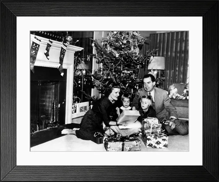Framed Print : Christmas with the Vice President's family. L-R: Patrician Nixon; Checkers, the cocker spaniel; Julie, age 5; Tricia, age 7, and Richard Nixon. Dec. 24, 1953 Framed Print : Christmas with the Vice President's family. L-R: Patrician Nixon; Checkers, the cocker spaniel; Julie, age 5; Tricia, age 7, and Richard Nixon. Dec. 24, 1953