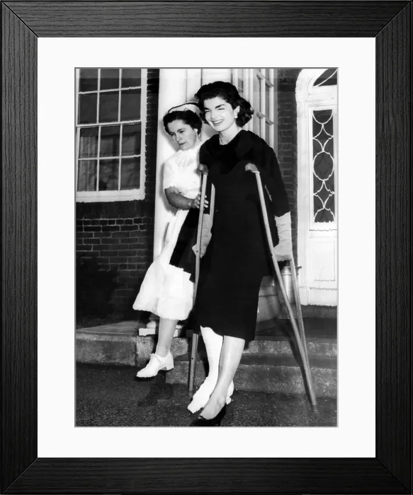 Framed Print : Jacqueline Kennedy, wife of Senator John Kennedy she leaves New England Baptist Hospital. She broke her right ankle while playing touch football at the Hyannis Port. Nov