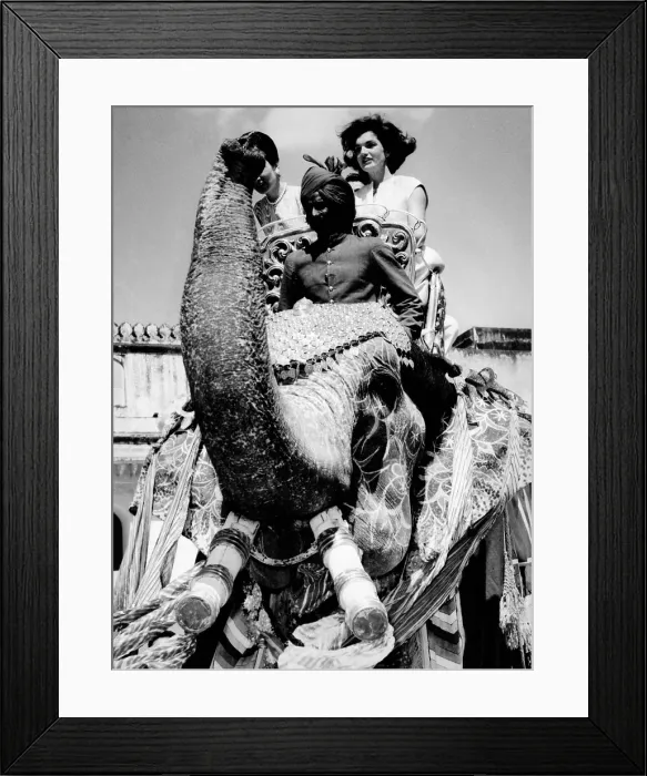 Framed Print : Jacqueline Kennedy and her sister, Princess Lee Radziwill (at left) take a ride atop an elephant