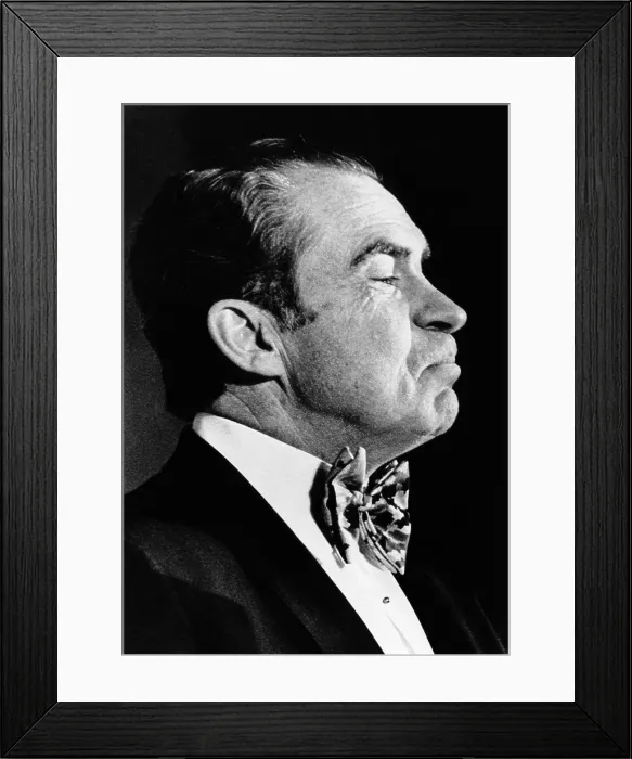 Framed Print : President Richard Nixon wearing a green satin oversized bow tie in honor of St. Patrick's Day