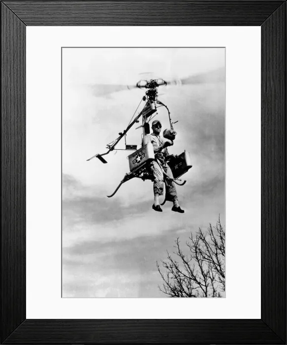 Framed Print : Rocket powered personal helicopter. Called the Pinwheel, it was a strap-on-the-back model and folded to the size of a phone booth