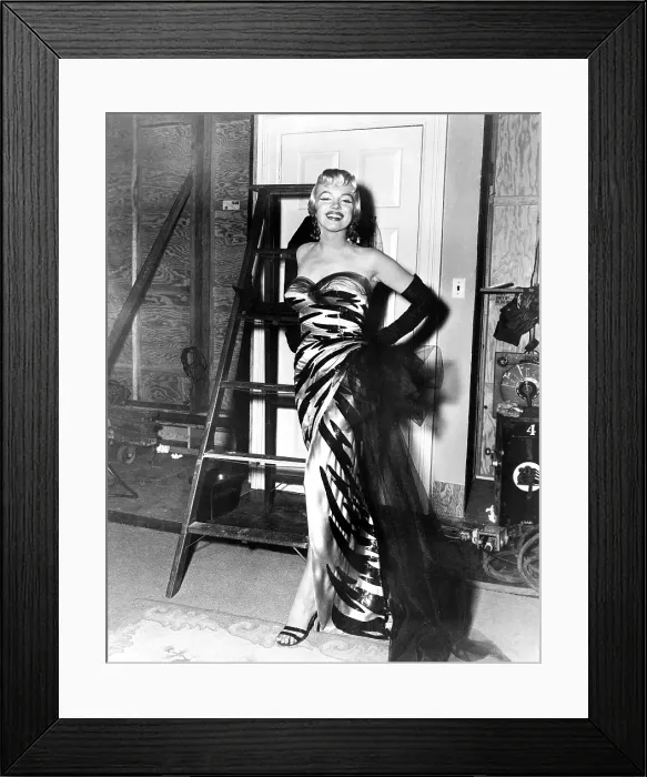 Framed Print : THE SEVEN YEAR ITCH, Marilyn Monroe (in a gown by William Travilla), on-set, autumn 1954. TM & Copyright 20th Century Fox Film Corp. / courtesy Everett Collection