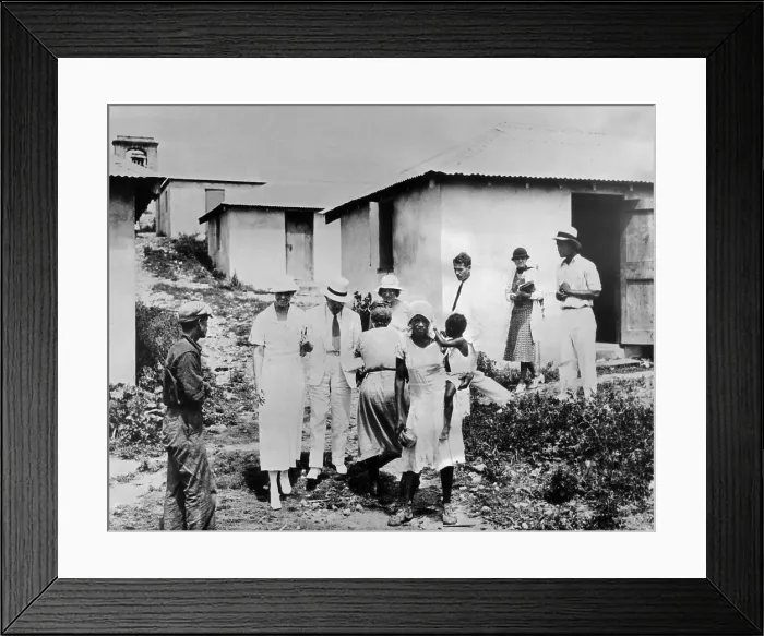 Framed Print : First Lady Eleanor Roosevelt tours the Virgin Islands. With Governor Paul Pearson, she visited residents of St. Croix living in new Pubic Works Administration (PWA) homes