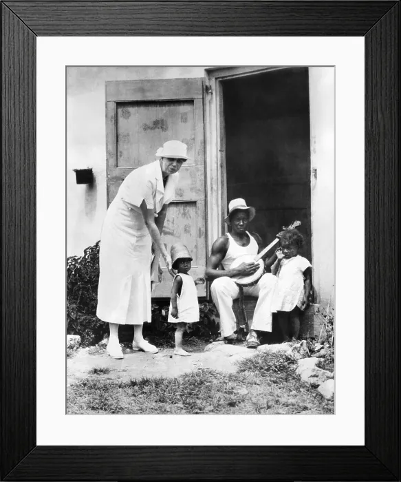 Framed Print : First Lady Eleanor Roosevelt chatting with the Winn family, of Christiansted, St. Croix. They live in Public Works Administration (PWA) housing. March 12, 1934 Framed Print : First Lady Eleanor Roosevelt chatting with the Winn family, of Christiansted, St. Croix. They live in Public Works Administration (PWA) housing. March 12, 1934
