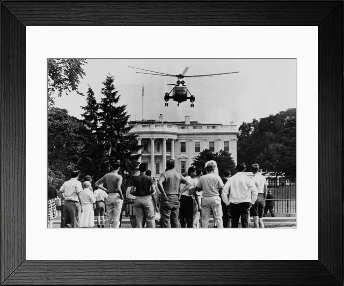 Framed Print : President John Kennedy's new helicopter takes off from the South Lawn. JFK flew over tourists on this way to the Governors Conference in Philadelphia. July 4, 1962