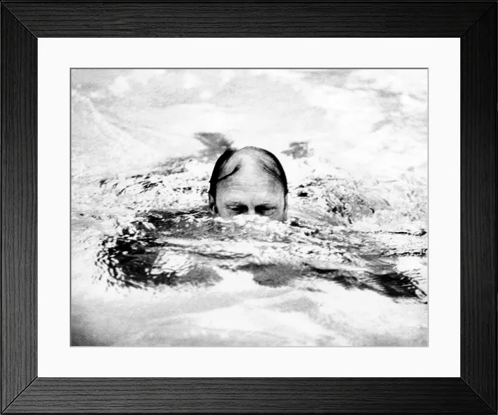 Framed Print : President Ford swimming in his backyard pool in Alexandria, Virginia, just three days after he assumed the Presidency. He would have a new outdoor pool built at the White House