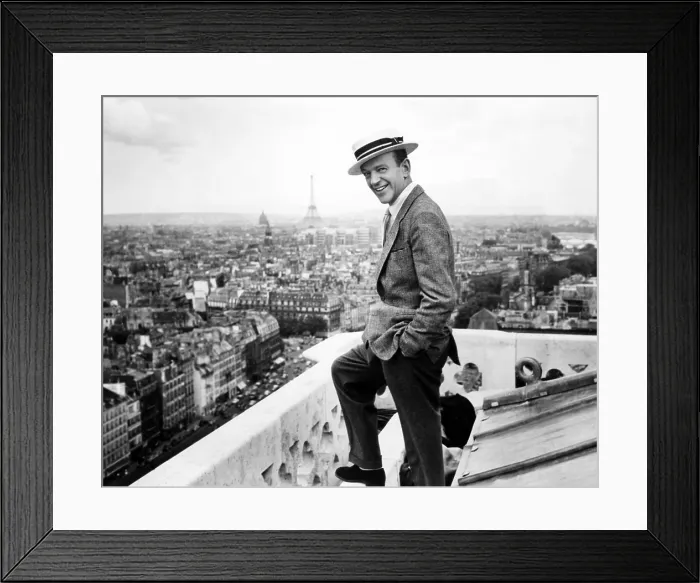 Framed Print : Fred Astaire takes a break from filming FUNNY FACE to enjoy the Parisian skyline, France, 1957 Framed Print : Fred Astaire takes a break from filming FUNNY FACE to enjoy the Parisian skyline, France, 1957