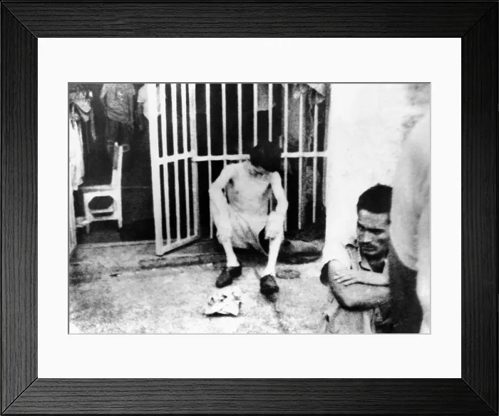 Framed Print : Conditions inside Castro's Cuban prisons. A photo smuggled out of Havana's Cabana Fortress, shows an emaciated prisoner, Lt. Hiram Gonzalez. February 1962 Framed Print : Conditions inside Castro's Cuban prisons. A photo smuggled out of Havana's Cabana Fortress, shows an emaciated prisoner, Lt. Hiram Gonzalez. February 1962