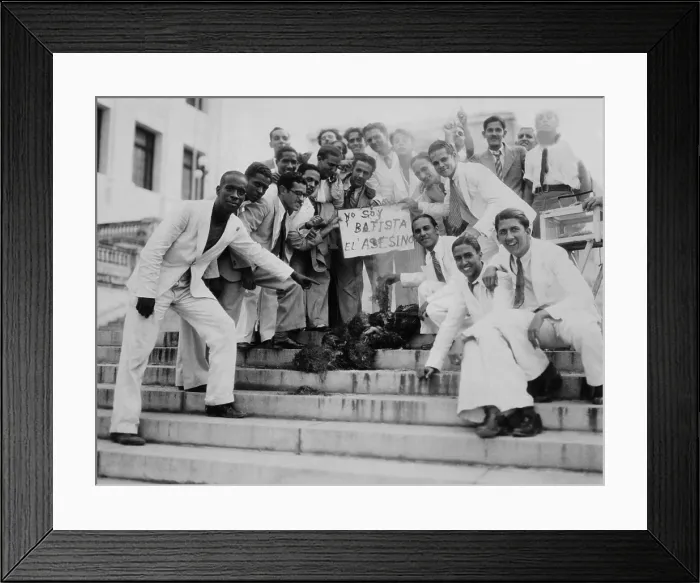 Framed Print : Cuba marks the first anniversary of the coup that overthrew the liberal Cespedes government. This group protested with a burned effigy the coup's leader, Col