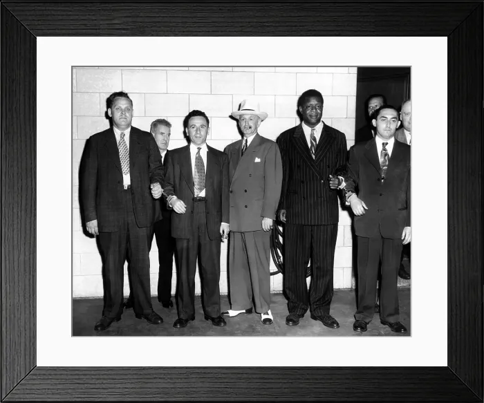 Framed Print : Communists on their way to jail. They were found guilty of conspiring to teach the overthrow of the U.S. government by violence. Federal Court House, New York City Framed Print : Communists on their way to jail. They were found guilty of conspiring to teach the overthrow of the U.S. government by violence. Federal Court House, New York City