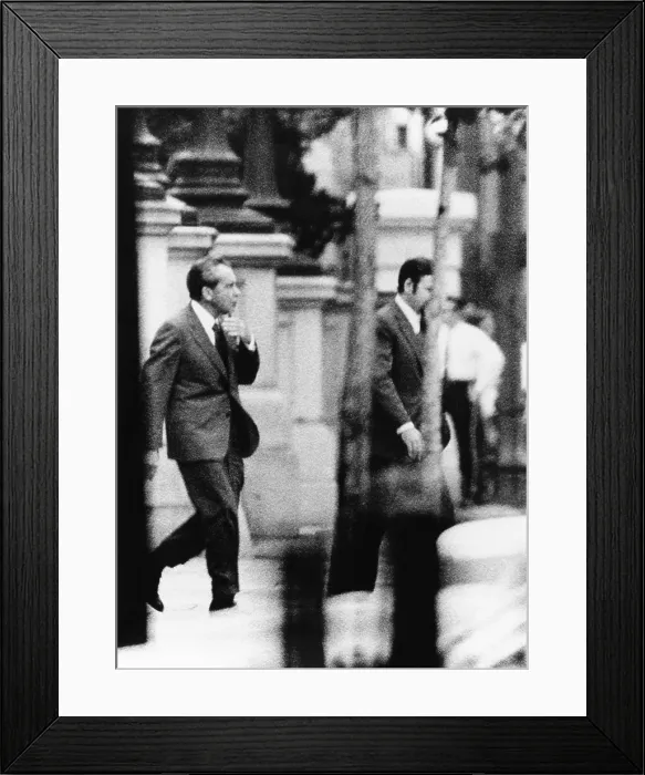 Framed Print : President Nixon, accompanied by Press Secy, Ronald Ziegler, walks to White House. Later in the day, Nixon announced his resignation. Aug. 8, 1974