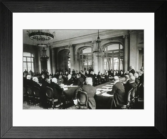 Framed Print : Treaty of Versailles (1919) at Palais de Trianon. Georges Clemenceau, standing, speaking to the German delegation. AISA / Everett Collection**US SALES ONLY** Framed Print : Treaty of Versailles (1919) at Palais de Trianon. Georges Clemenceau, standing, speaking to the German delegation. AISA / Everett Collection**US SALES ONLY**