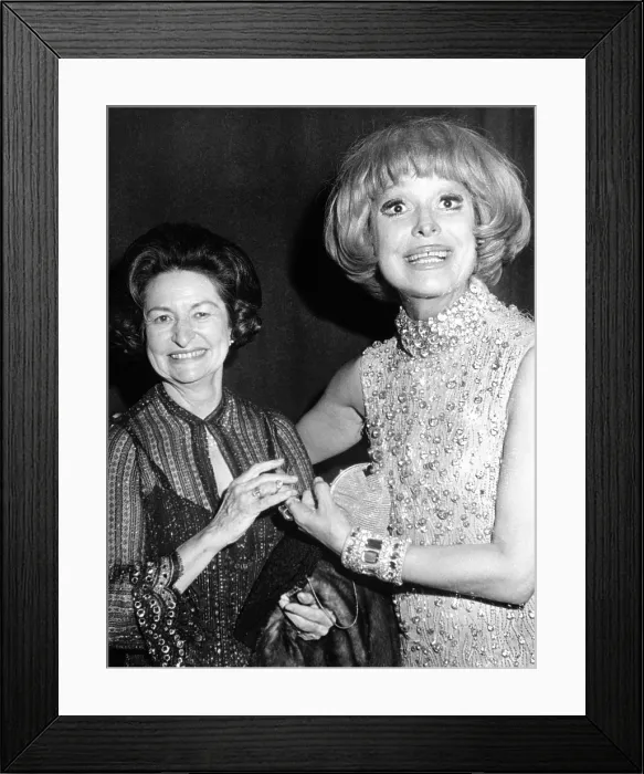 Framed Print : Former First Lady visits Carol Channing back stage. Lady Bird Johnson attended Channing's new Broadway musical, Lorelei. in New York City. Feb. 8, 1974