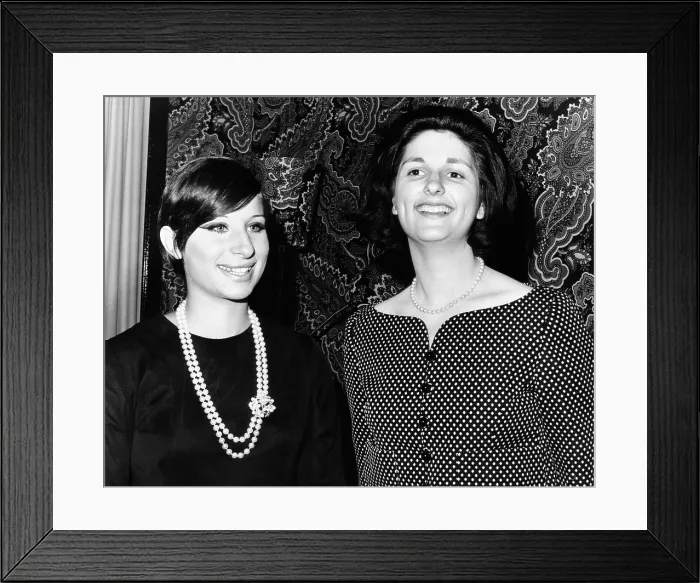 Framed Print : Lynda Bird Johnson (right) is greeted backstage by Barbra Streisand