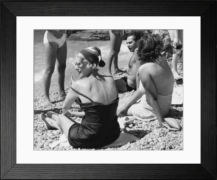 Framed Print : Clare Booth Luce (wearing hat) relaxes with friends at the Beach on Capri Island, Italy. Aug. 28, 1953. She served as U.S. Ambassador to Italy from May 1953 to April 1956 Framed Print : Clare Booth Luce (wearing hat) relaxes with friends at the Beach on Capri Island, Italy. Aug. 28, 1953. She served as U.S. Ambassador to Italy from May 1953 to April 1956