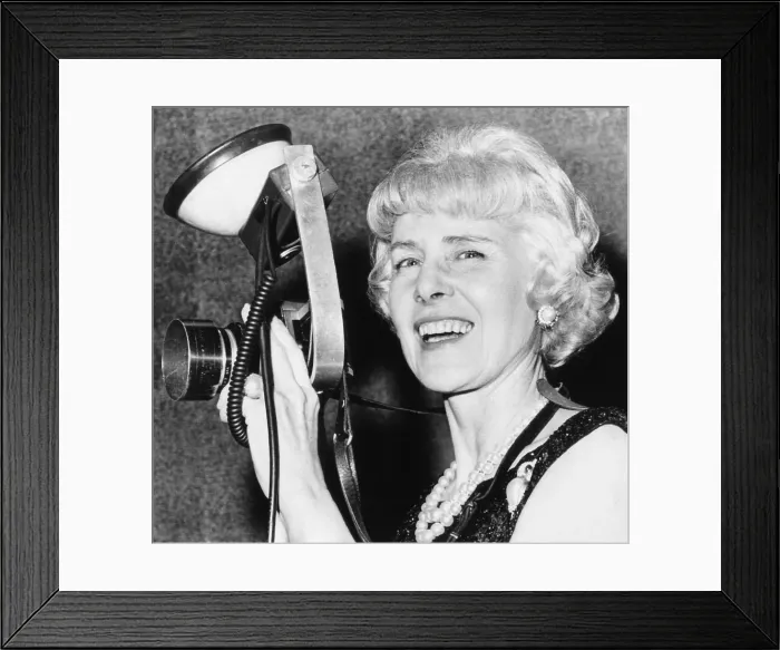 Framed Print : Clare Booth Luce tries out a photographer's camera at a Go with Goldwater dinner. Oct. 9, 1964 Framed Print : Clare Booth Luce tries out a photographer's camera at a Go with Goldwater dinner. Oct. 9, 1964