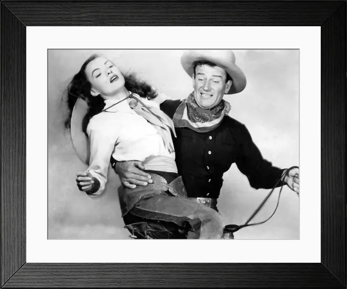 Framed Print : TALL IN THE SADDLE, Ella Raines, John Wayne, 1944