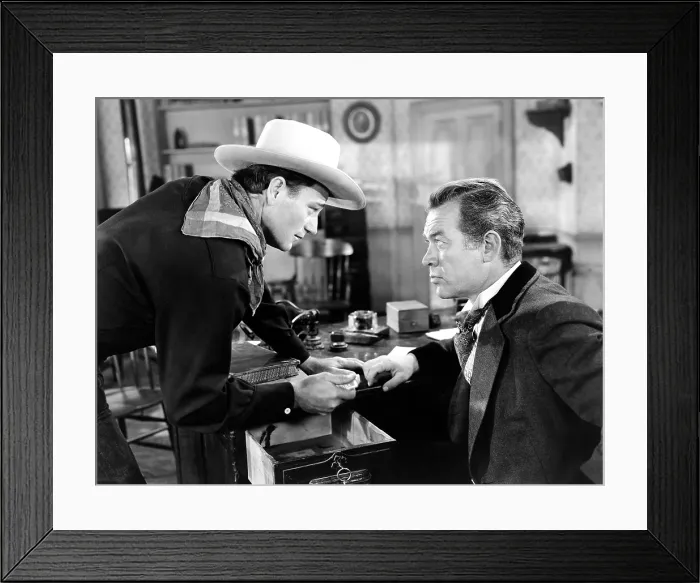 Framed Print : TALL IN THE SADDLE, from left, John Wayne, Ward Bond, 1944