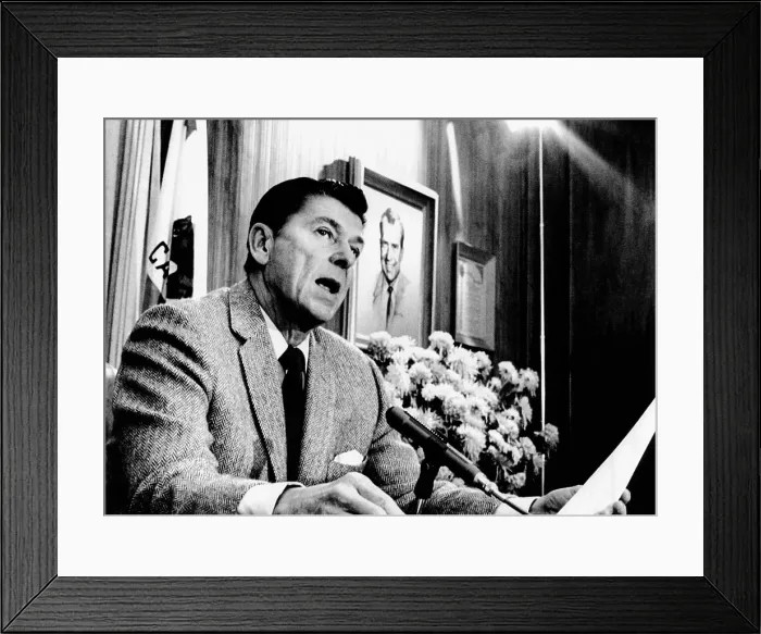 Framed Print : California Gov. Ronald Reagan speaking with newsmen about a dispute between his office and the US Dept. of Health, Education and Welfare. Jan. 3, 1971 Framed Print : California Gov. Ronald Reagan speaking with newsmen about a dispute between his office and the US Dept. of Health, Education and Welfare. Jan. 3, 1971