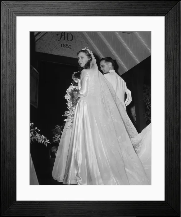 Framed Print : Paulina Longworth enters the Emmanuel Episcopal Church in Winchester by the Sea, Mass. On Aug. 26, 1944 she married Alexander McCormick Sturm. (CSU_2015_8_598)