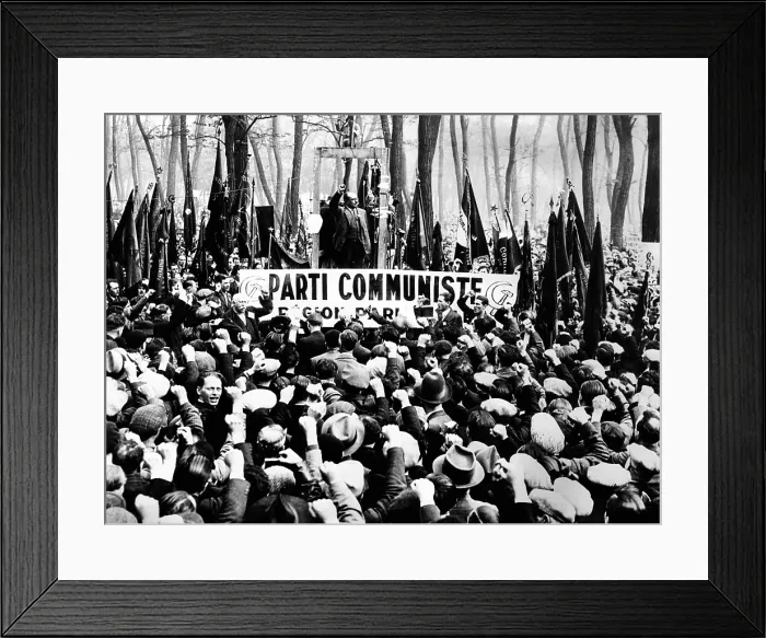 Framed Print : Jacques Cuclox, Secretary General of the ARAC, an organization of World War 1 Veterans, making clenched fist salute at a Communist mass meeting in the Bois of Vincennes in Paris Framed Print : Jacques Cuclox, Secretary General of the ARAC, an organization of World War 1 Veterans, making clenched fist salute at a Communist mass meeting in the Bois of Vincennes in Paris