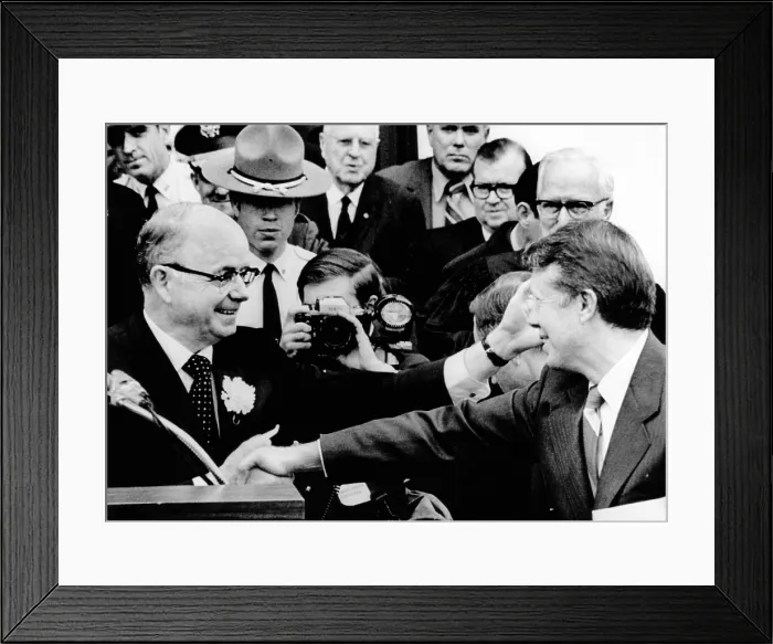 Framed Print : Newly Inaugurated Georgia Governor Jimmy Carter (right) shakes hands with his predecessor, segregationist Lester Maddox. Jan. 13, 1971 Framed Print : Newly Inaugurated Georgia Governor Jimmy Carter (right) shakes hands with his predecessor, segregationist Lester Maddox. Jan. 13, 1971