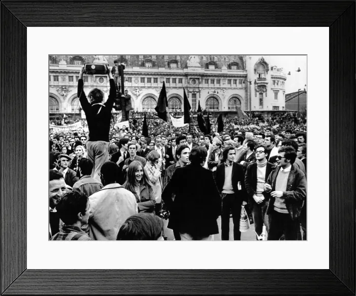 Framed Print : Demonstrators listen to the broadcast address of President Charles de Gaulle during a Paris general strike on May 24, 1968