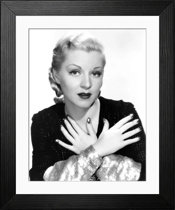 Framed Print : DANTE'S INFERNO, Claire Trevor, wearing sterling-silver press-on nails, 1935. TM and copyright Fox Film Corp. All rights reserved / courtesy Everett Collection