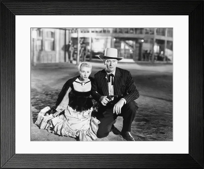 Framed Print : DAKOTA, from left, Vera Ralston, (aka Vera Hruba Ralston), John Wayne, 1945 Framed Print : DAKOTA, from left, Vera Ralston, (aka Vera Hruba Ralston), John Wayne, 1945