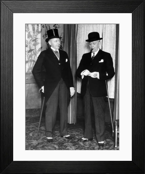 Framed Print : Formal dress for men in 1930s. One gentleman prefers the top hat to the Bowler (or derby); an ascot to a tie, a cutaway over the standard cut
